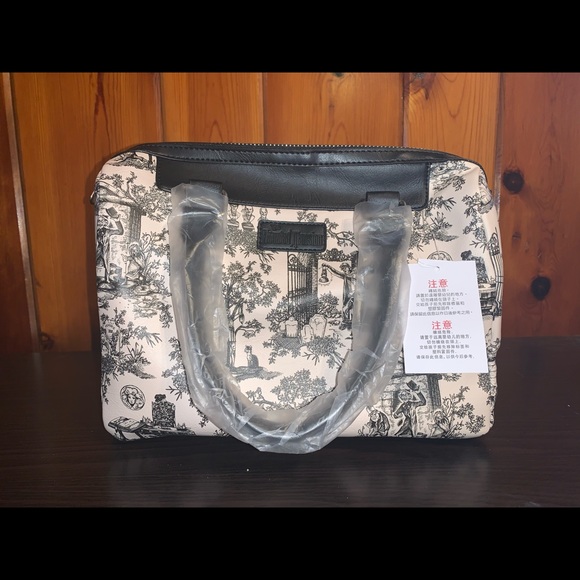 Disney Handbags - Haunted Mansion toile Satchel